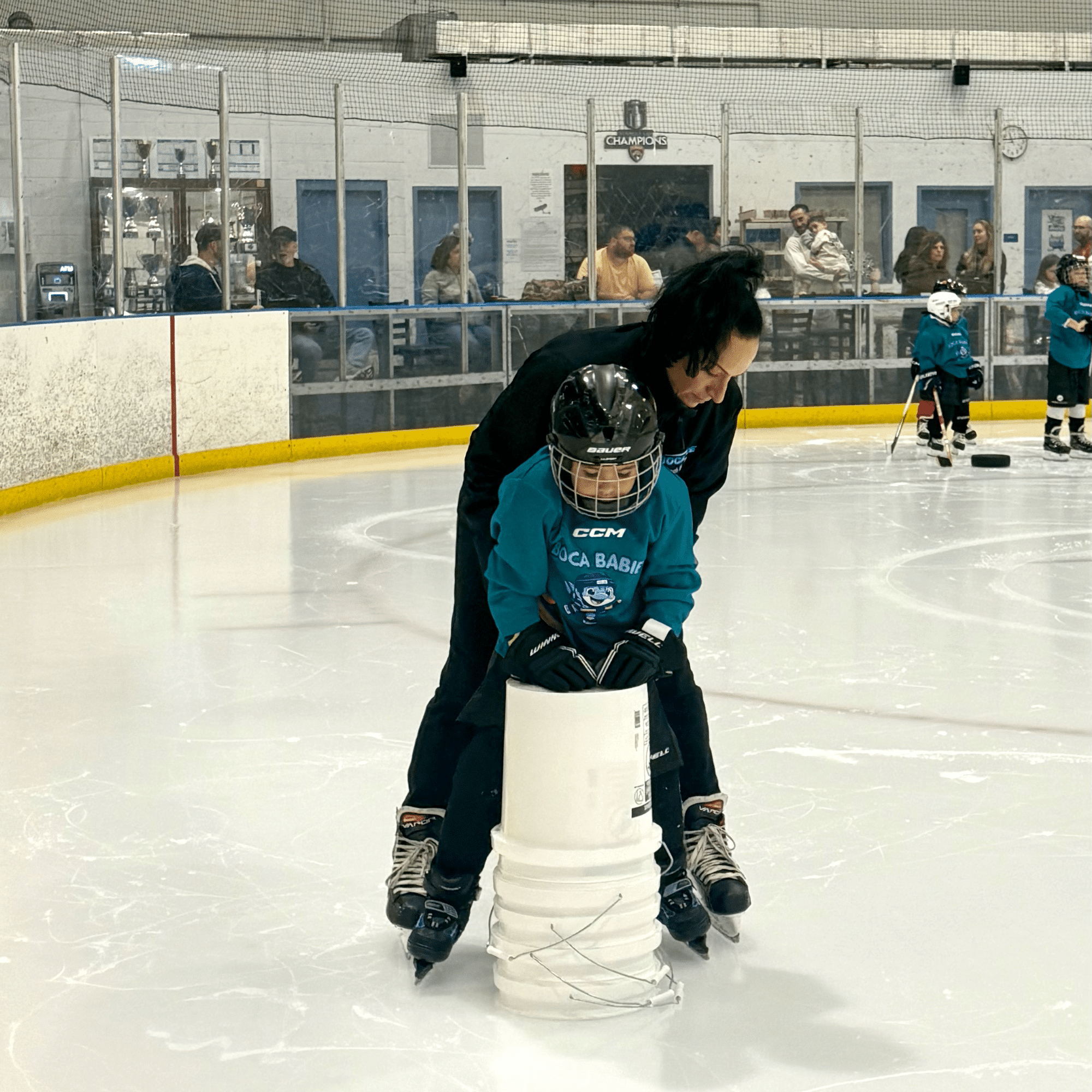 Boca Babies player learning hockey
